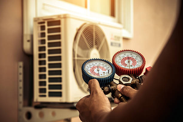 Professional Hvac technician working in Helena, MO